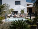 Garden View Apartment with Shared Pool & Mountain Views